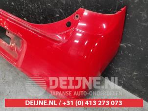 Daihatsu Cuore Achterbumper O655757 foto 3