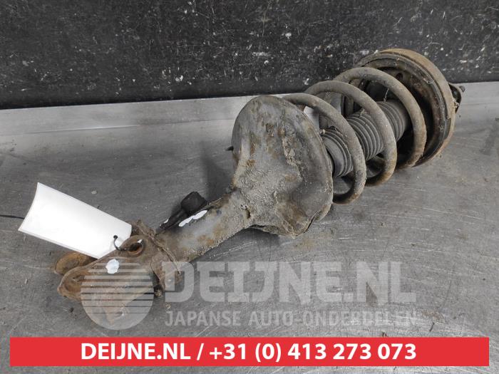 Hyundai Coupe Schokdemperpoot links-voor O656055