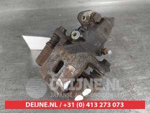 Hyundai Coupe Bremszange links hinten O656156 foto 2