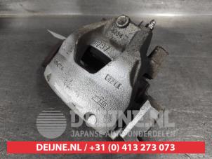 Toyota Yaris Bremszange links vorne O656177 foto 2