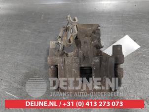 Toyota Yaris Bremszange rechts hinten O656473 foto 3