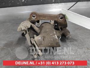 Toyota Yaris Bremszange rechts hinten O656473 foto 2