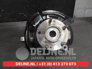 Kia Niro Achsschenkel links vorne O657100 foto 2