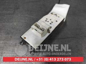 Toyota Yaris Multi-functional window switch O657631 photo 2