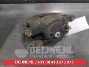 Toyota IQ Bremszange rechts vorne O657669 foto 3