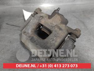 Toyota IQ Bremszange rechts vorne O657669 foto 2