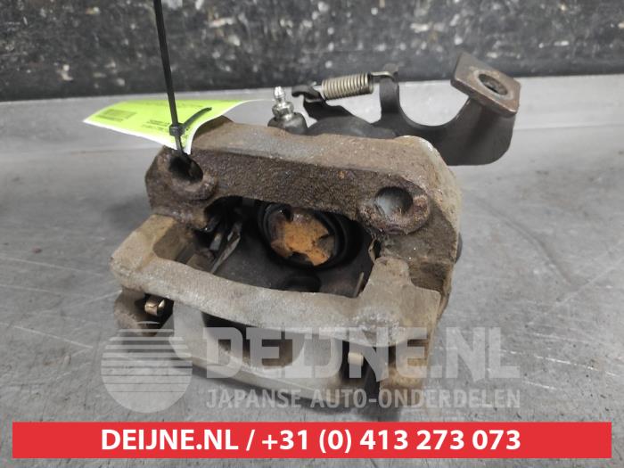 Toyota IQ Bremszange rechts hinten O657670