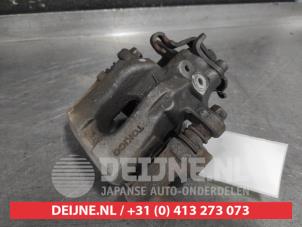 Toyota IQ Rear brake calliper, right O657670 photo 2