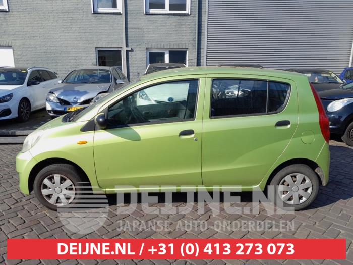 Daihatsu Cuore Portierruit 4Deurs links-voor O658083