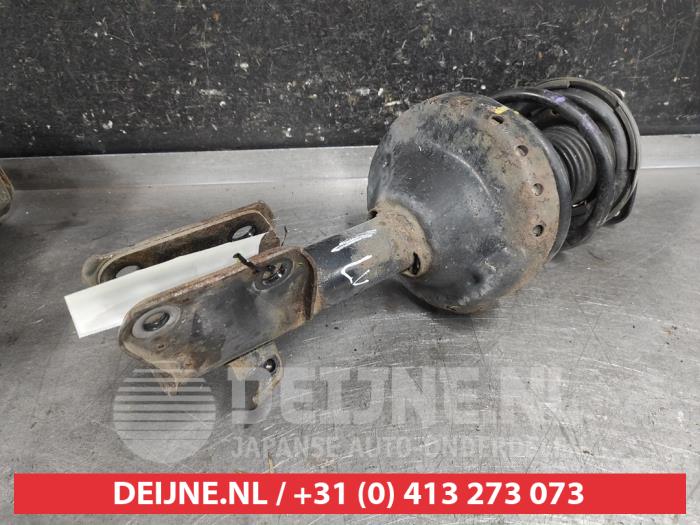 Subaru Impreza Schokdemperpoot links-voor O658162
