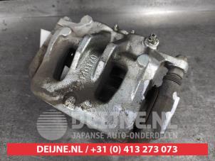 Ssang Yong Korando Bremszange links vorne O658879 foto 2