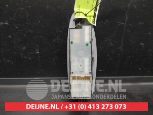 Nissan Almera Tino Multi-functional window switch O659172 photo 2