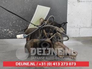 Daihatsu Materia Achsschenkel links vorne O660131 foto 2