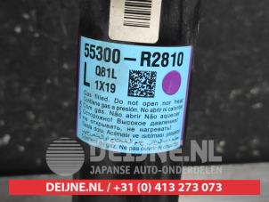 Kia Sportage Schokdemper links-achter O660723 foto 3