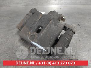 Kia Sorento Rear brake calliper, left O661899 photo 2