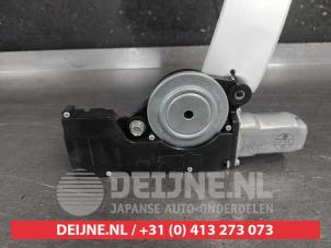 Subaru Legacy Schiebedach Motor O661961 foto 2