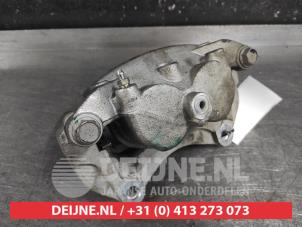 Nissan Qashqai Bremszange links vorne O662740 photo 3