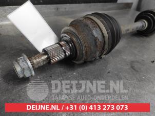 Mazda 3 Aandrijfas links-voor O662911 foto 2