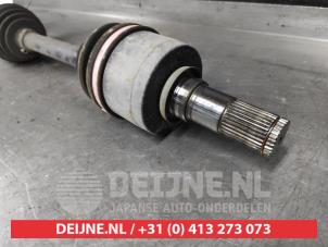Mazda 3 Aandrijfas links-voor O662911 foto 3