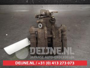 Nissan Almera Tino Remklauw (Tang) links-achter O663436 foto 3