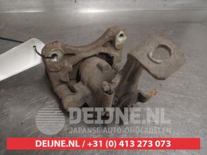 Nissan Almera Tino Remklauw (Tang) links-achter O663436 foto 2