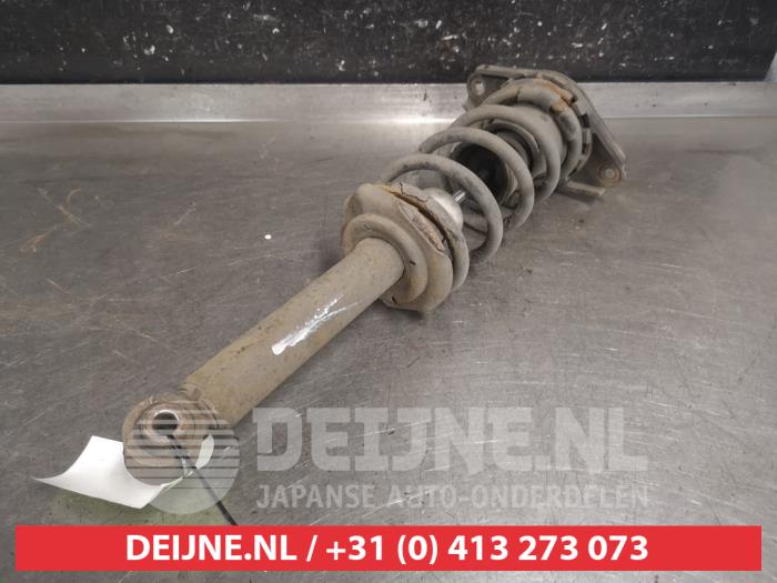 Nissan Almera Tino Schokdemperpoot rechts-achter O663440