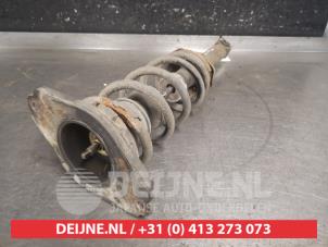 Nissan Almera Tino Schokdemperpoot rechts-achter O663440 foto 2