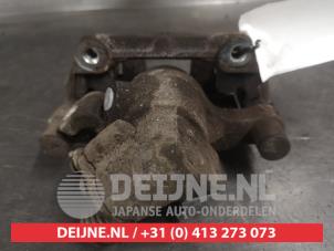 Mazda 5 Bremszange links hinten O663486 foto 2