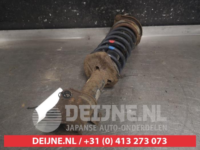 Mazda Demio Schokdemperpoot links-voor O663559