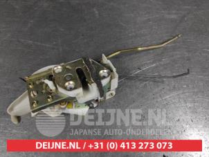 Mazda Demio Door lock mechanism 4-door, front left O663593 photo 2