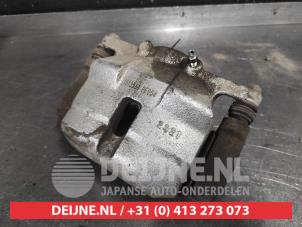 Nissan Qashqai Front brake calliper, left O664587 photo 2