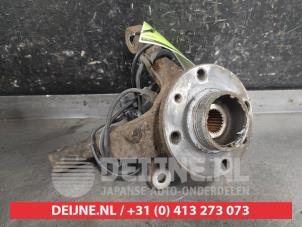 Nissan Note Achsschenkel links vorne O665294 foto 2