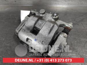 Suzuki Swift Front brake calliper, left O665705 photo 2