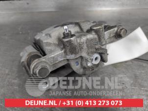 Suzuki Swift Front brake calliper, left O665705 photo 3
