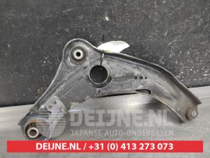Nissan Micra Front lower wishbone, left O666147 photo 2