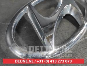 Hyundai Bayon Embleem O666425 foto 3