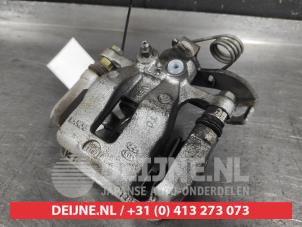 Hyundai Bayon Bremszange links hinten O666500 foto 2