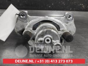 Toyota Yaris Bremszange links vorne O667352 foto 2