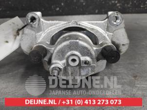 Toyota Yaris Front brake calliper, right O667353 photo 2