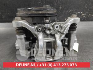 Toyota Yaris Bremszange rechts hinten O667355 foto 3
