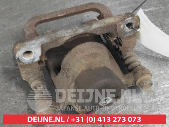 Nissan Qashqai Remklauw (Tang) links-achter O668101