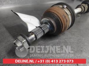 Nissan Micra Antriebswelle links vorne O668312 foto 2