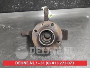 Nissan Note Achsschenkel links vorne O668381 foto 2