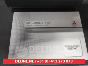Mitsubishi Outlander Instruction Booklet O668642 photo 2