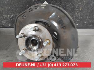 Toyota Yaris Achsschenkel rechts vorne O668924 foto 2