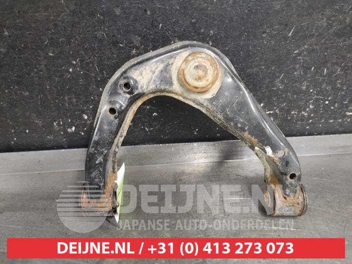 Nissan Navara Front upper wishbone, right O669155