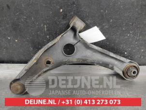 Mitsubishi Colt Front lower wishbone, right O669680 photo 2