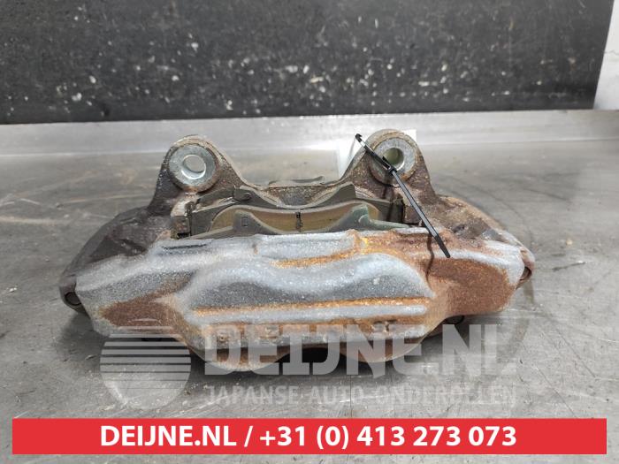 Toyota Hilux Front brake calliper, left O669829