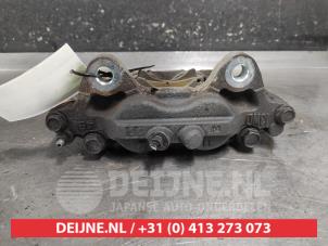 Toyota Hilux Front brake calliper, left O669829 photo 2