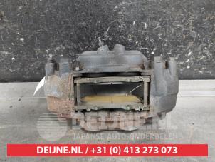 Toyota Hilux Front brake calliper, left O669829 photo 3